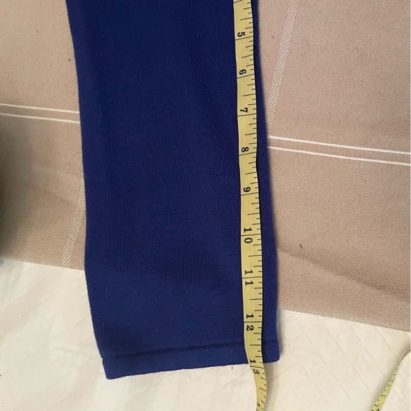 Spense Medium Midi Length knit Dress in a black and royal Blue print. - Picture 10 of 11